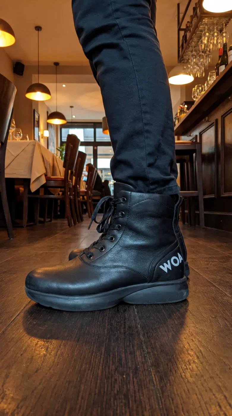 Restaurant manager wearing Walking On Air shoes up close